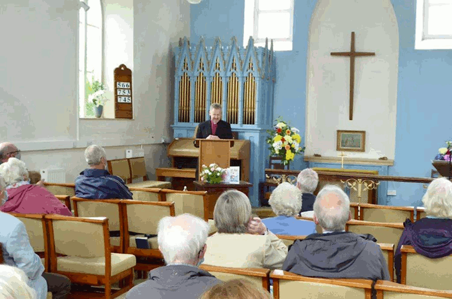 the congregation in the Methodist Church before its closure 